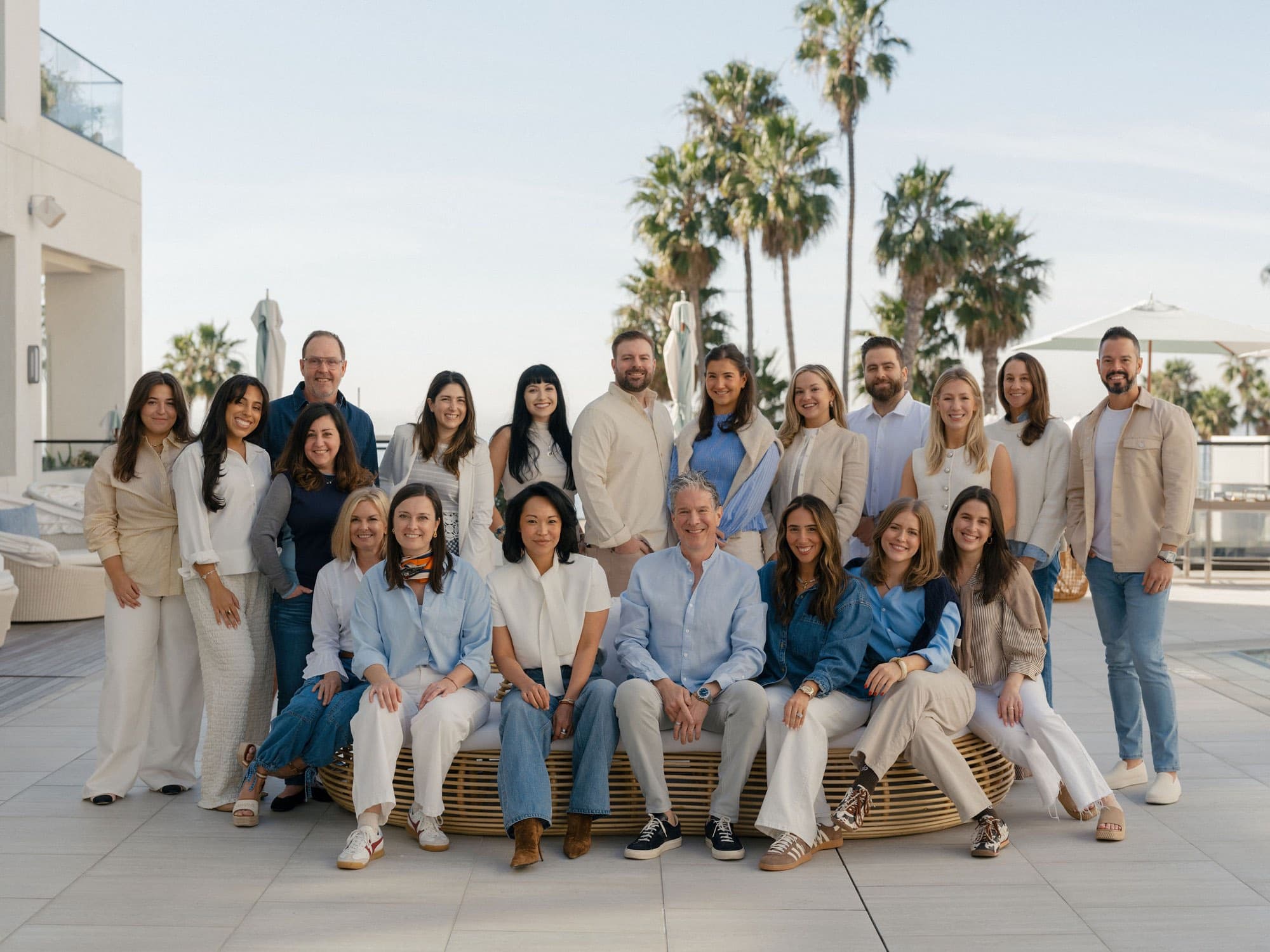The SmartFlyer Brand Team posing together on a terrace
