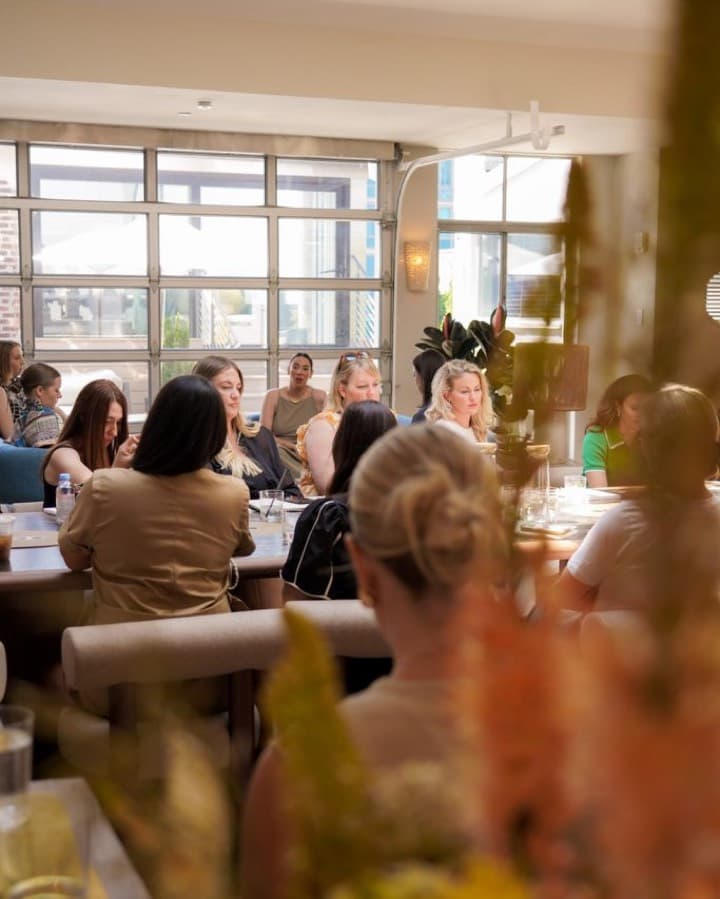 Guests dining in a bright restaurant