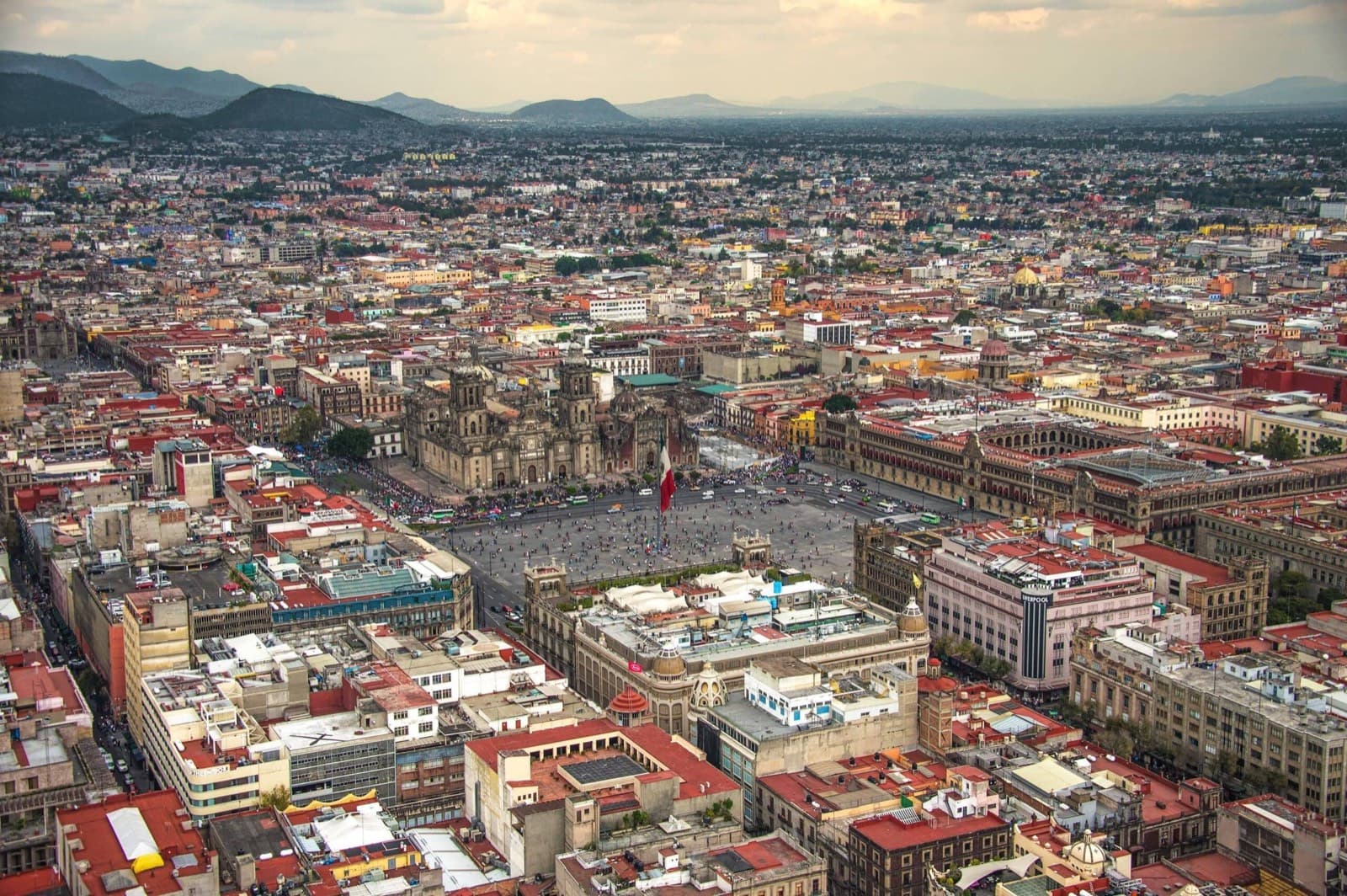 The old town of a large city with a cathedral square, seen from above